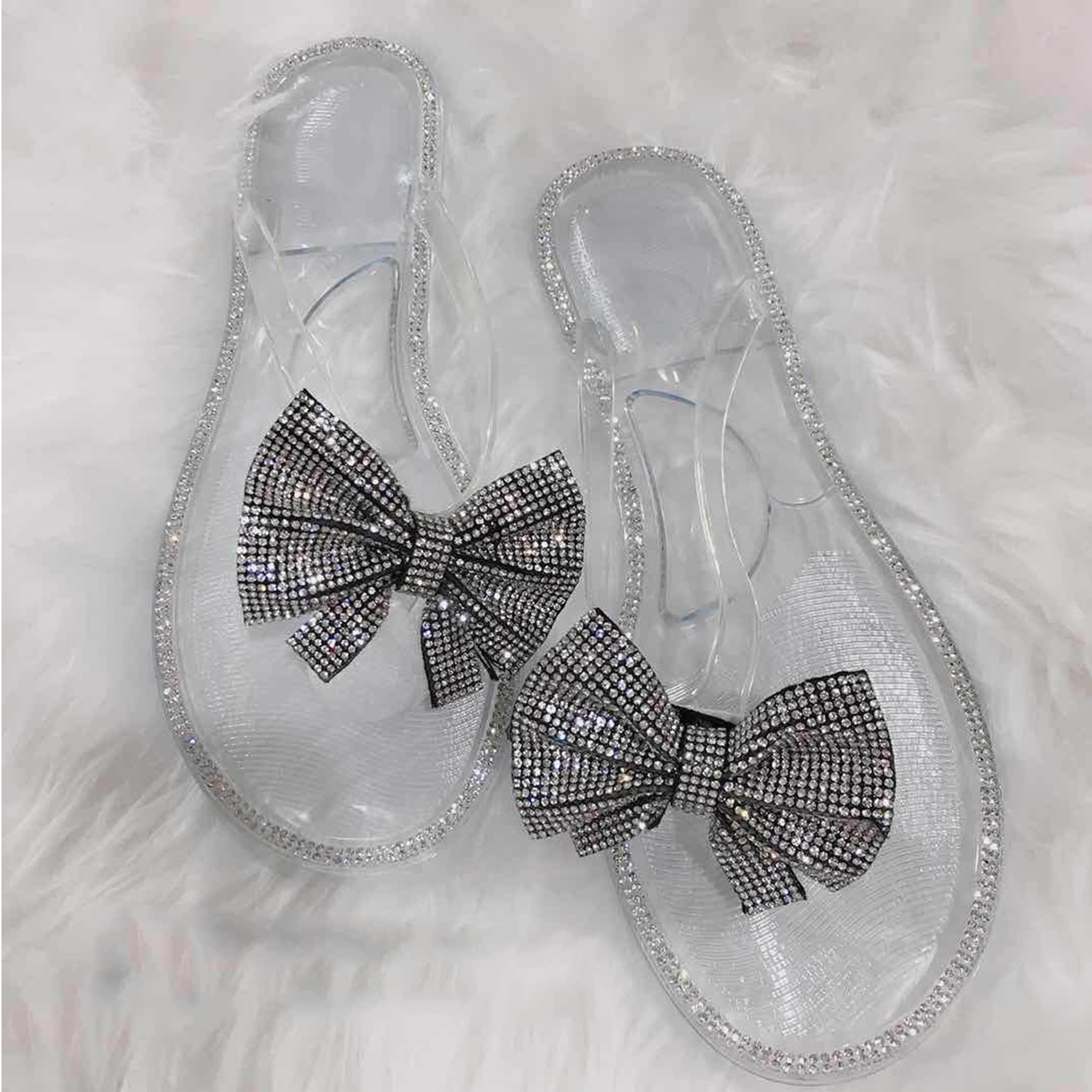 Moda mujer Diamante de imitación brillante Bling verano suave zapatilla plana Nudo de mariposa lazo Tielady diapositivas Flip Flop zapatos